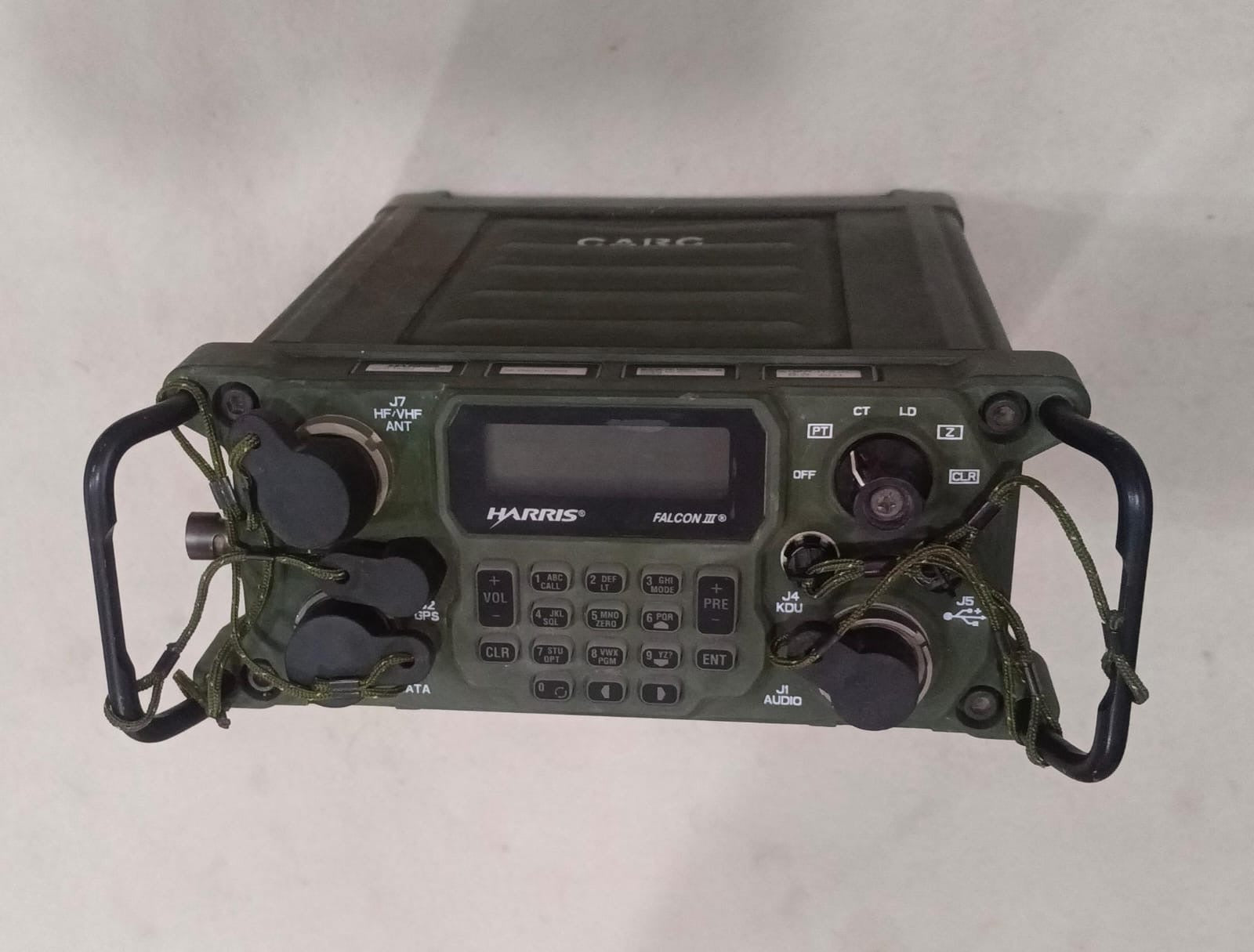 Harris Falcon 3 harris RF 7800H MP military radio transmitter set in olive green, featuring a digital display screen, keypad, and front handles, photographed against a plain off-white background. worldwide Shipping
